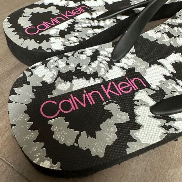Calvin Klein black and white flip flops. - Picture 2 of 6